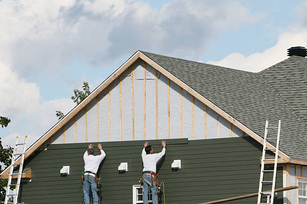 Professional Vinyl Siding technician working in Mead, CO